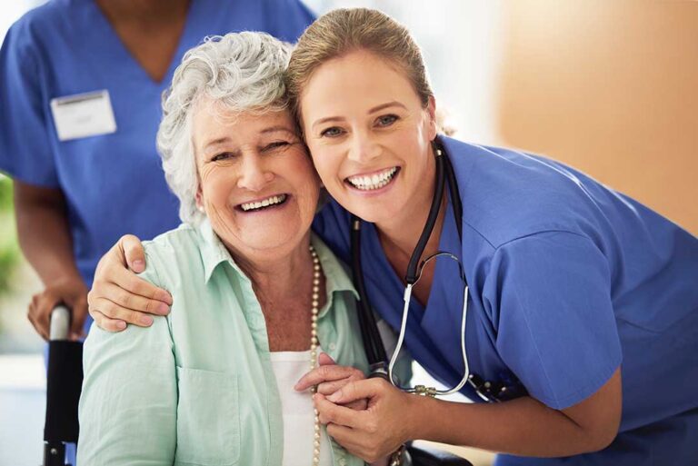 Older adult reviewing care expenses with a family member at a kitchen table.